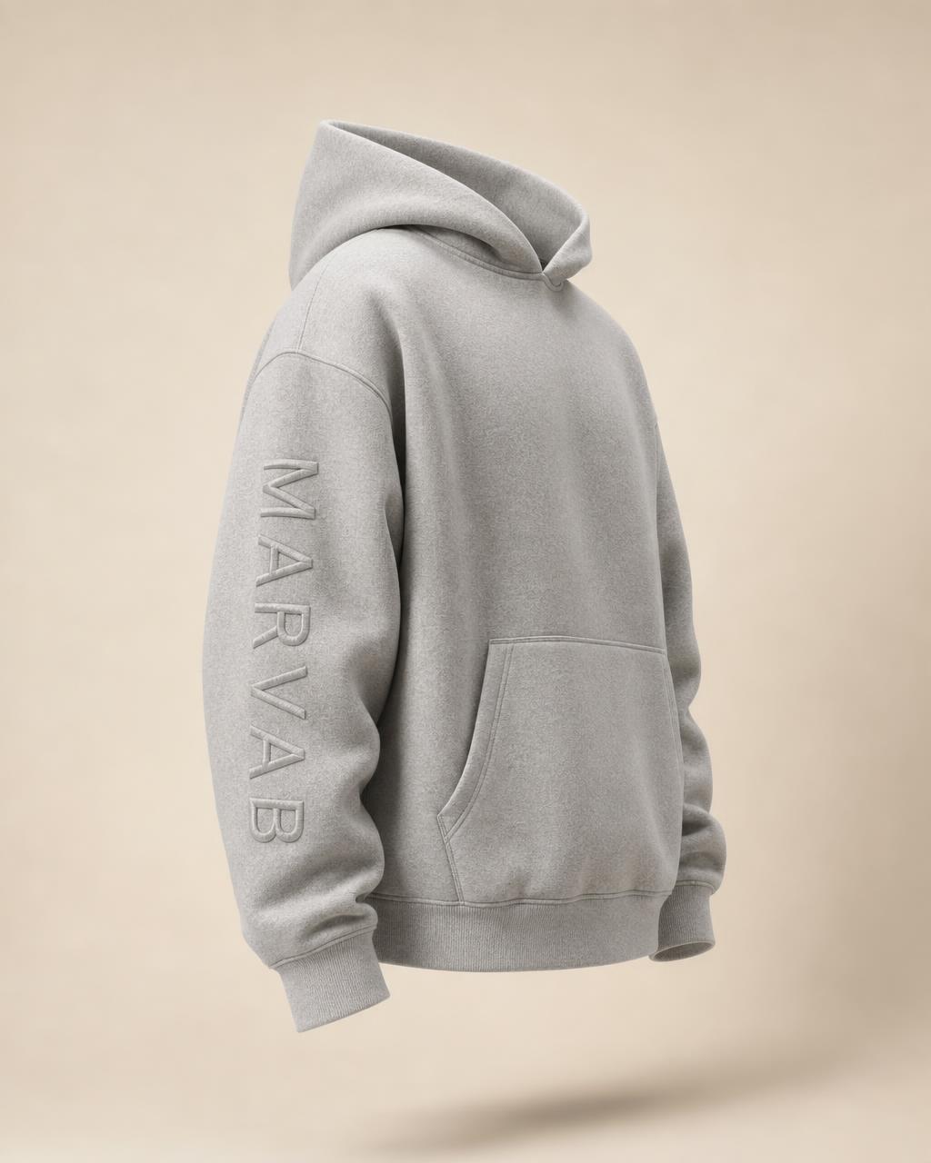 MARVAB CORE 001 hoodie in Heather Grey, showing the vertical sleeve embroidery