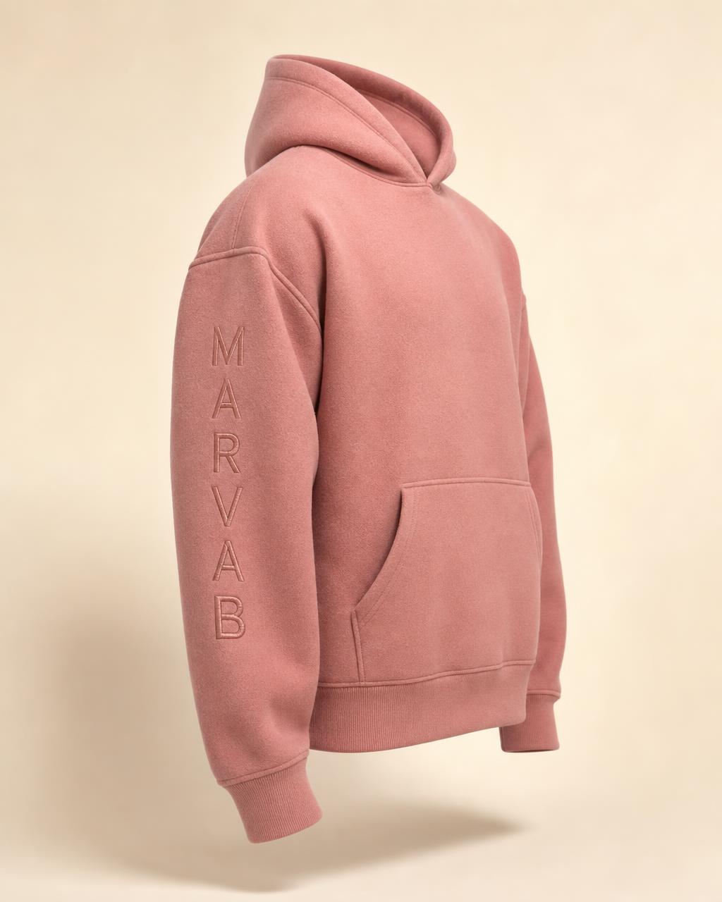 MARVAB CORE 001 hoodie in Dusty Rose, showing the vertical sleeve embroidery