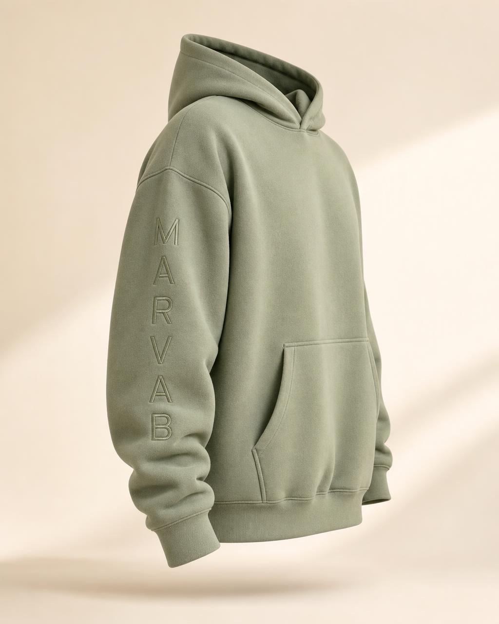 MARVAB CORE 001 hoodie in Sage, showing the vertical sleeve embroidery